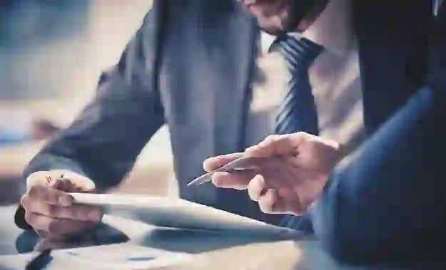 man working in office writing